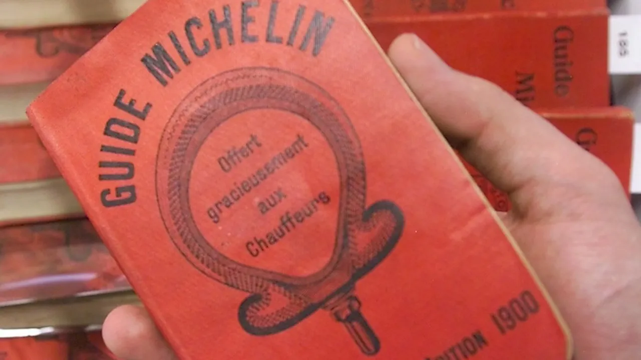 A small red book with French text; the first Michelin guide and the origin of the Michelin star