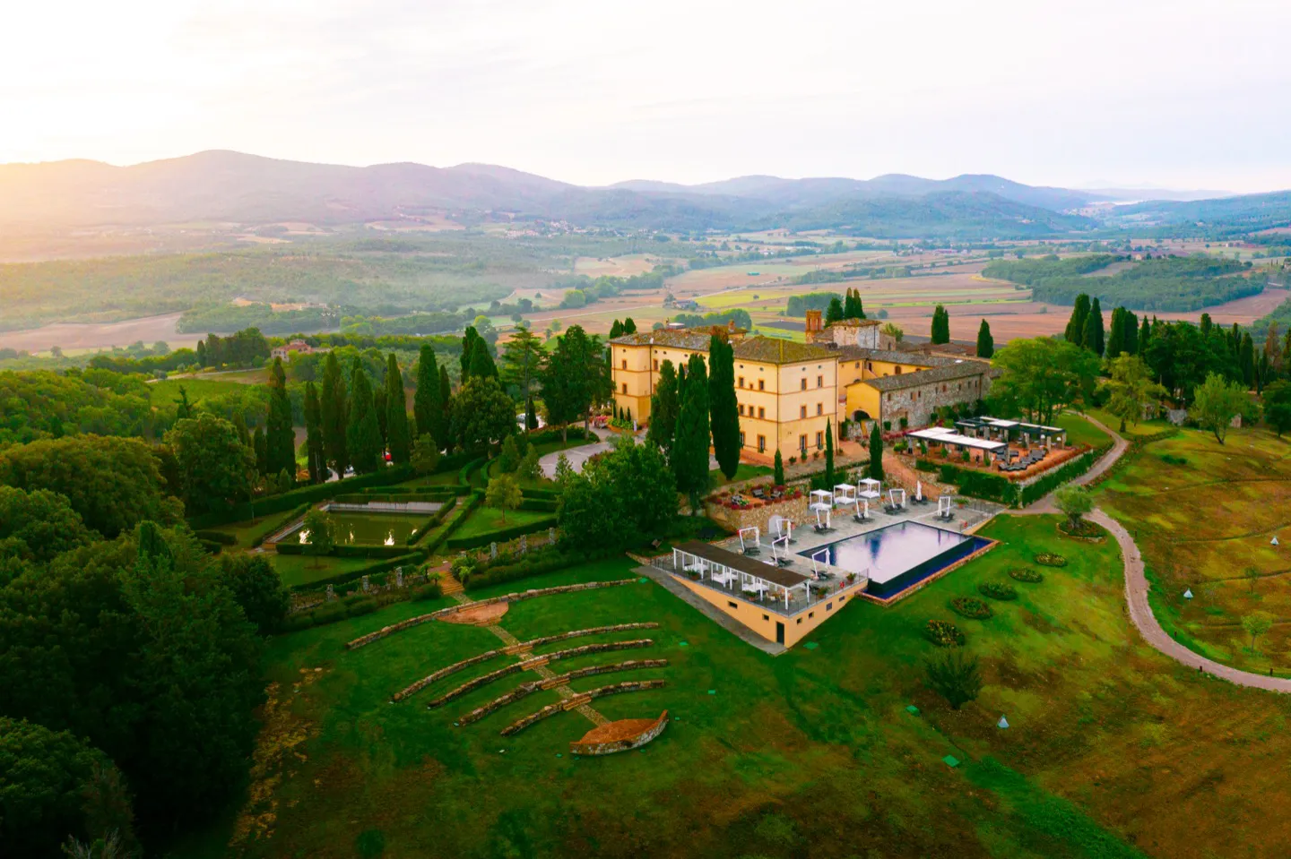 aerial view of belmond castello di casole on a luxury driving tour of tuscany