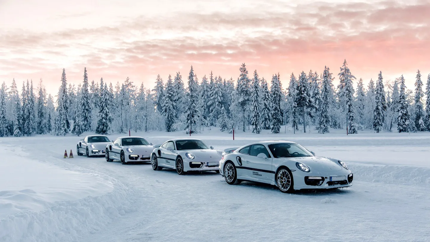 Four Porsches ready to drive on snow in Lapland 