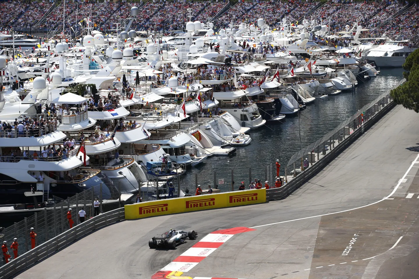 F1 cars drive past guests aboard superyachts in Monaco for this iconic F1 Grand Prix